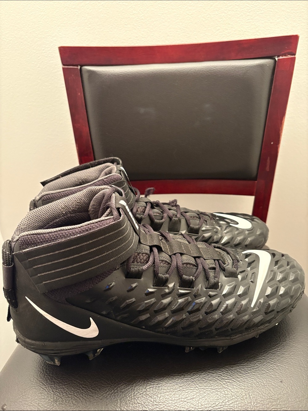 Nike Men's Black Athletic Cleats with White Swoosh